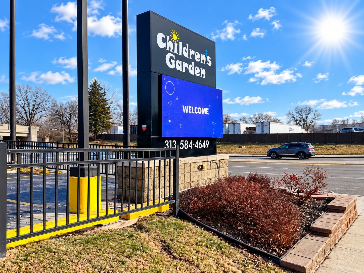 Side view of the Children's Garden outdoor LED monument sign