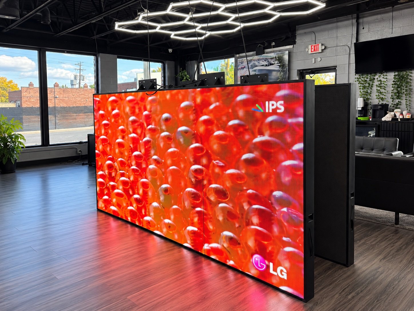 Greenfield Motors indoor LED display showing bright red test content