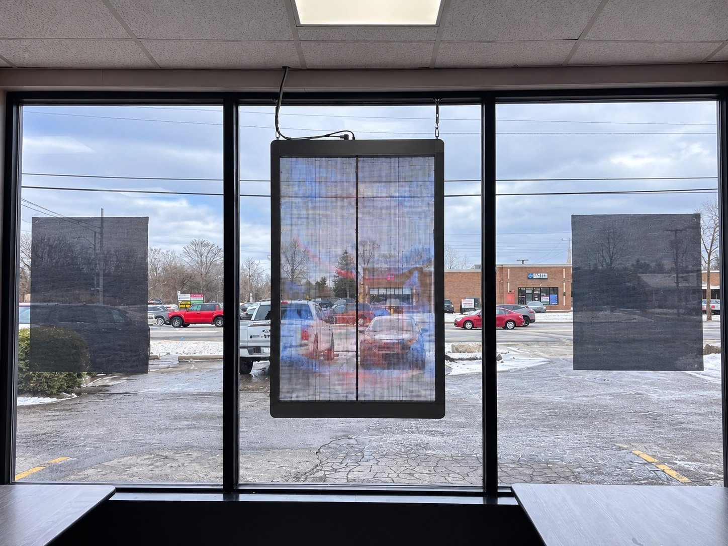 Interior view through the transparent LED poster at Lefty's Livonia