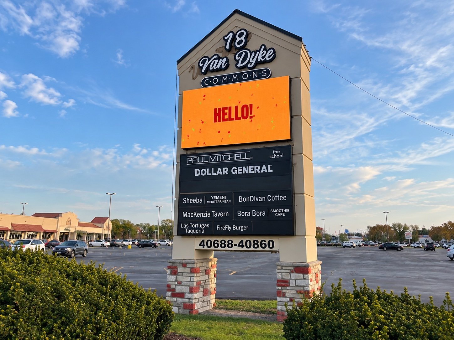 Van Dyke Commons LED monument sign displaying a hello message